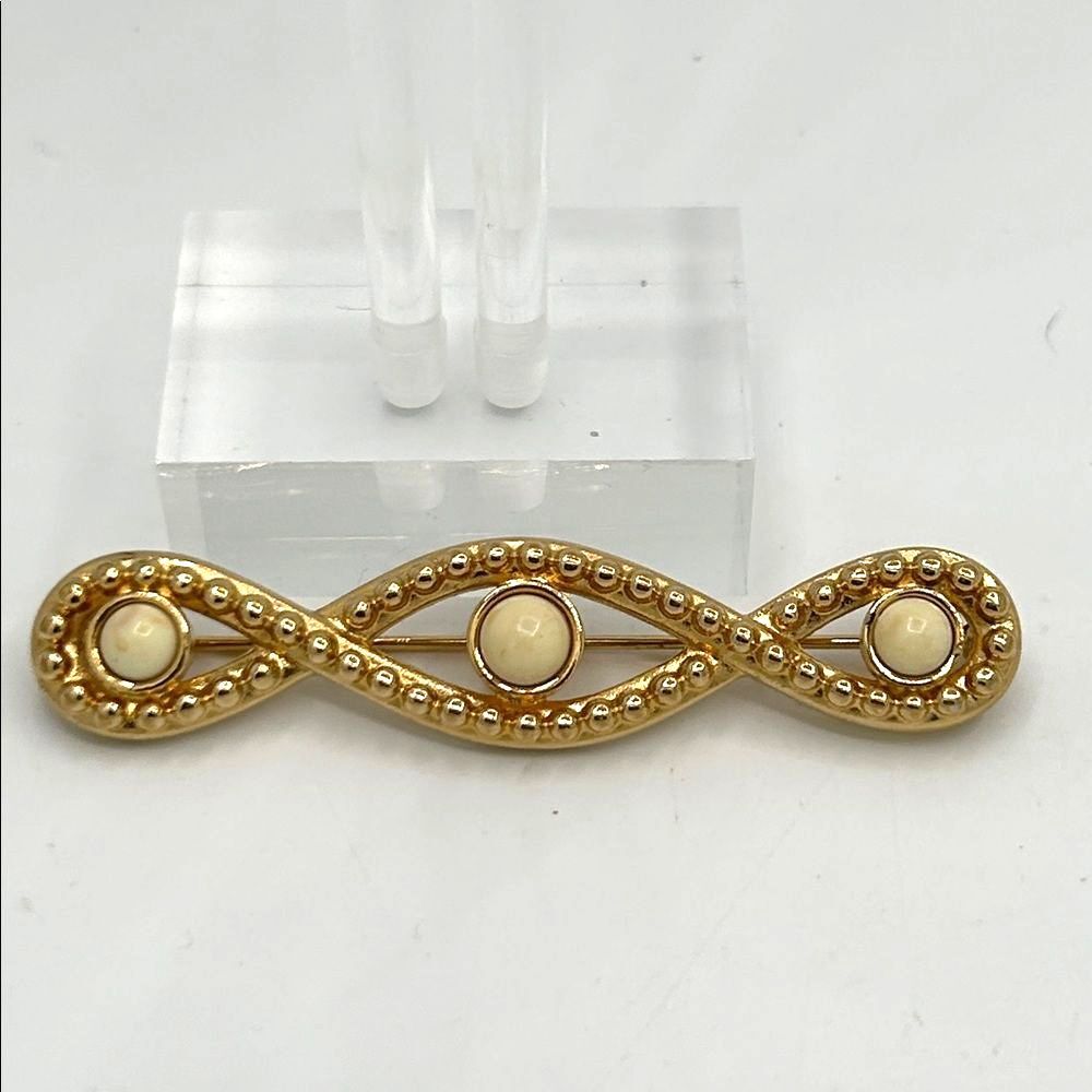Monet Gold Infinity Brooch with Cream Accents